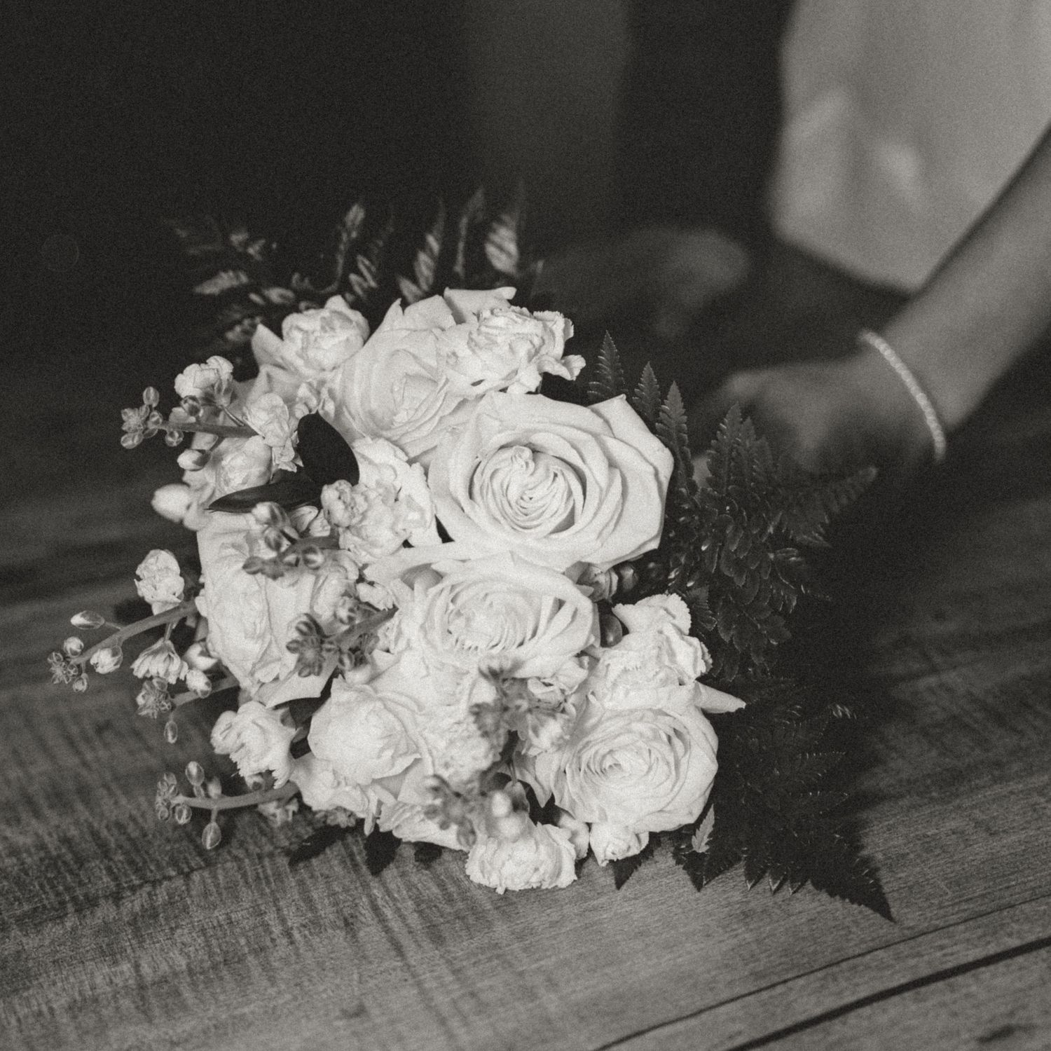 black and white documentary style image of bridal bouquet in vernon bc
