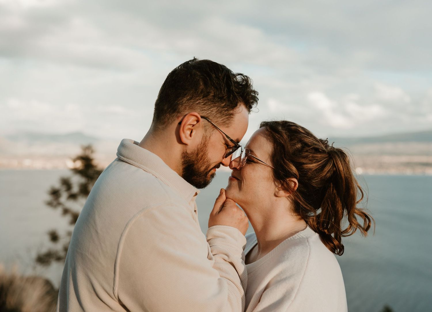 engaged couple sharing intimate moment looking into each others eyes during west kelowna engagement session