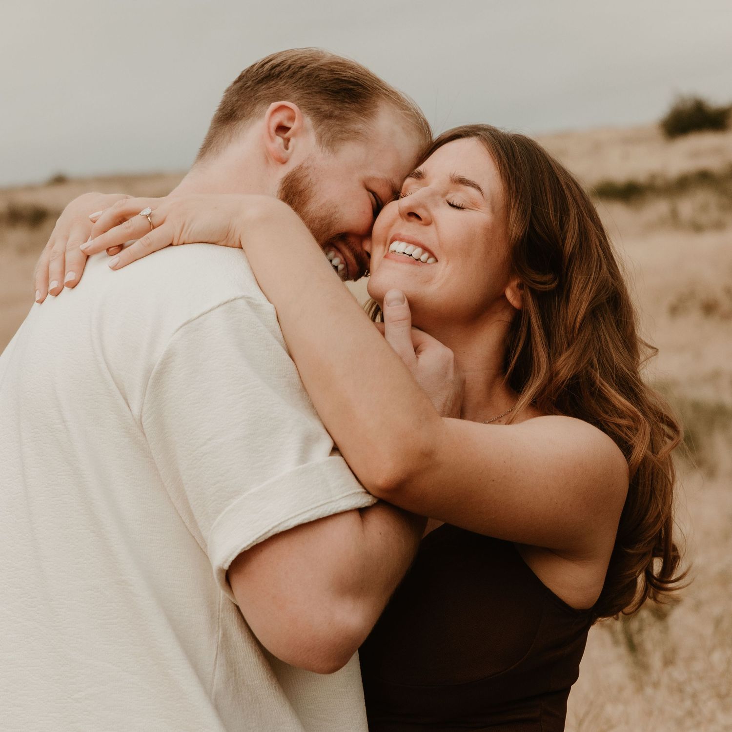 candid image of couple in kalamoir regional park during couples photo session