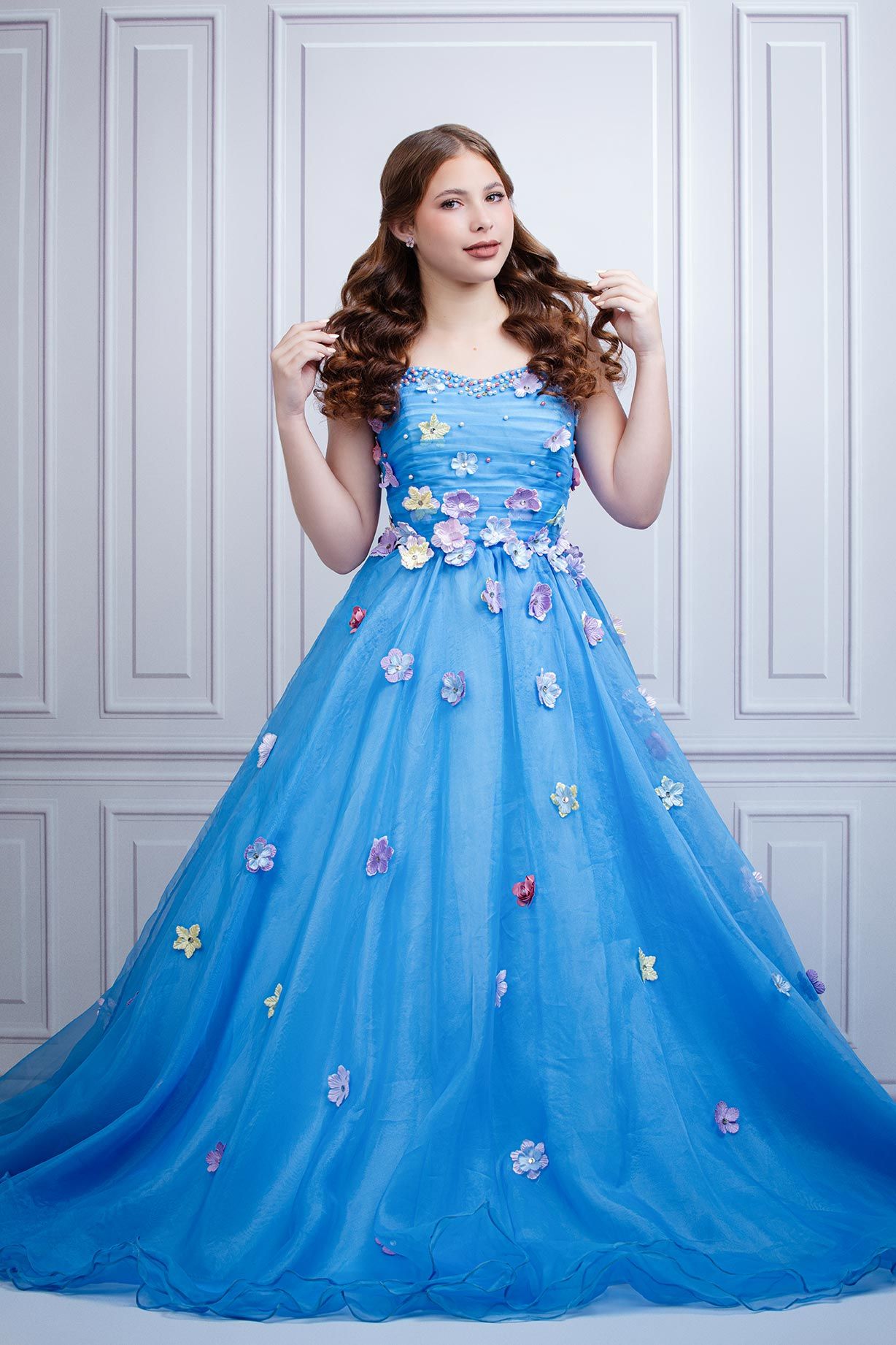 Stunning bright blue princess ball gown with scattered floral details and sweetheart neckline.