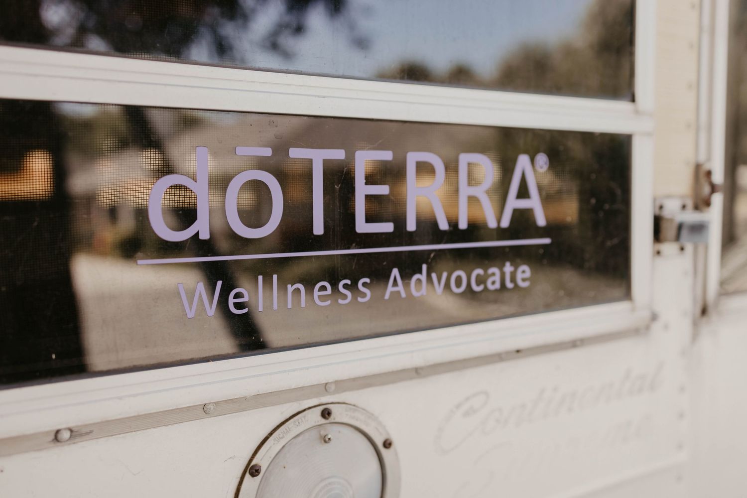 Exterior signage showing doTERRA wellness advocate branding.