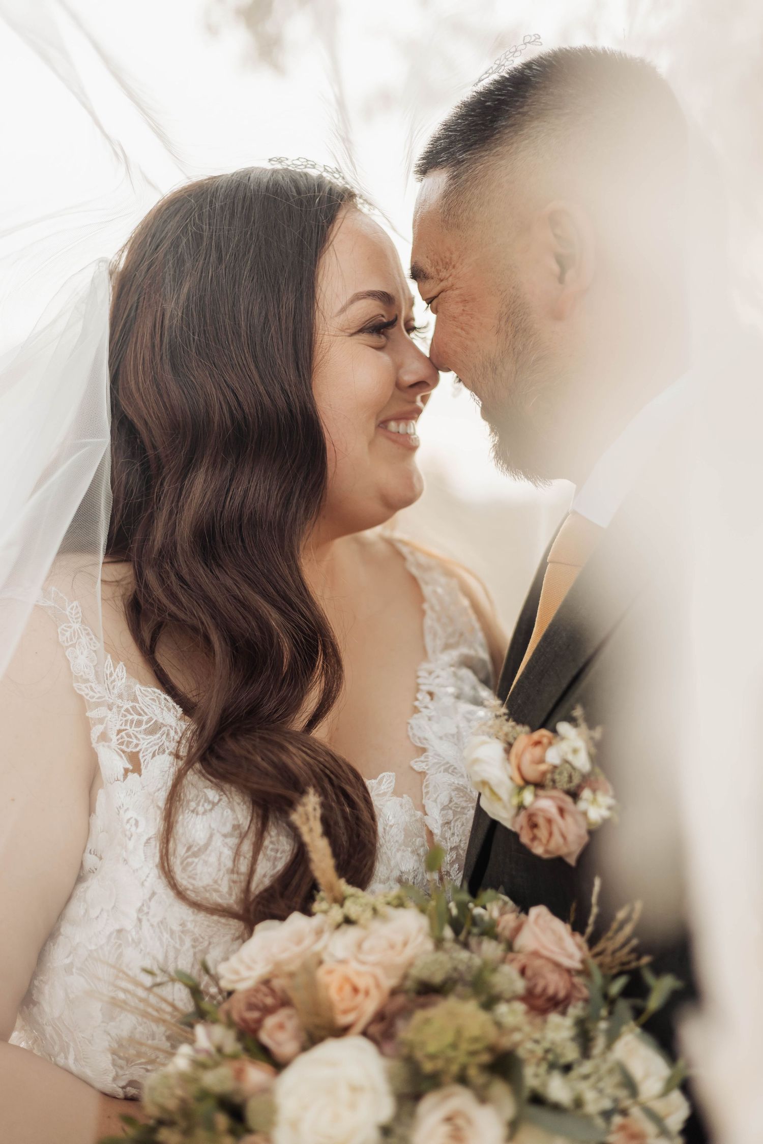 Intimate wedding portrait showing tender moments between the couple.