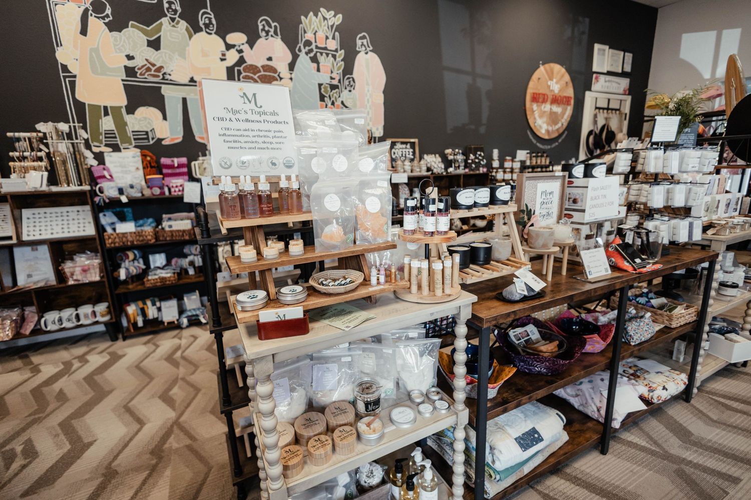 Boutique shelving units displaying various merchandise and decor items.