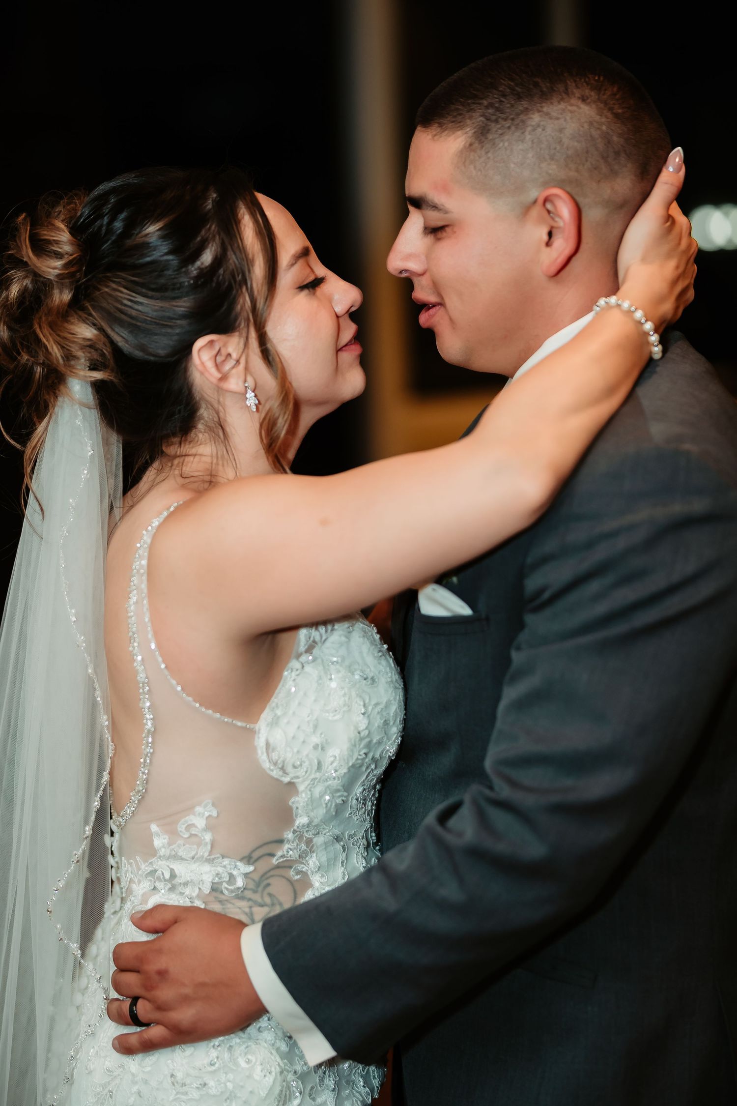 Sequence of frames showing dancing couple in wedding attire sharing an intimate slow dance moment.