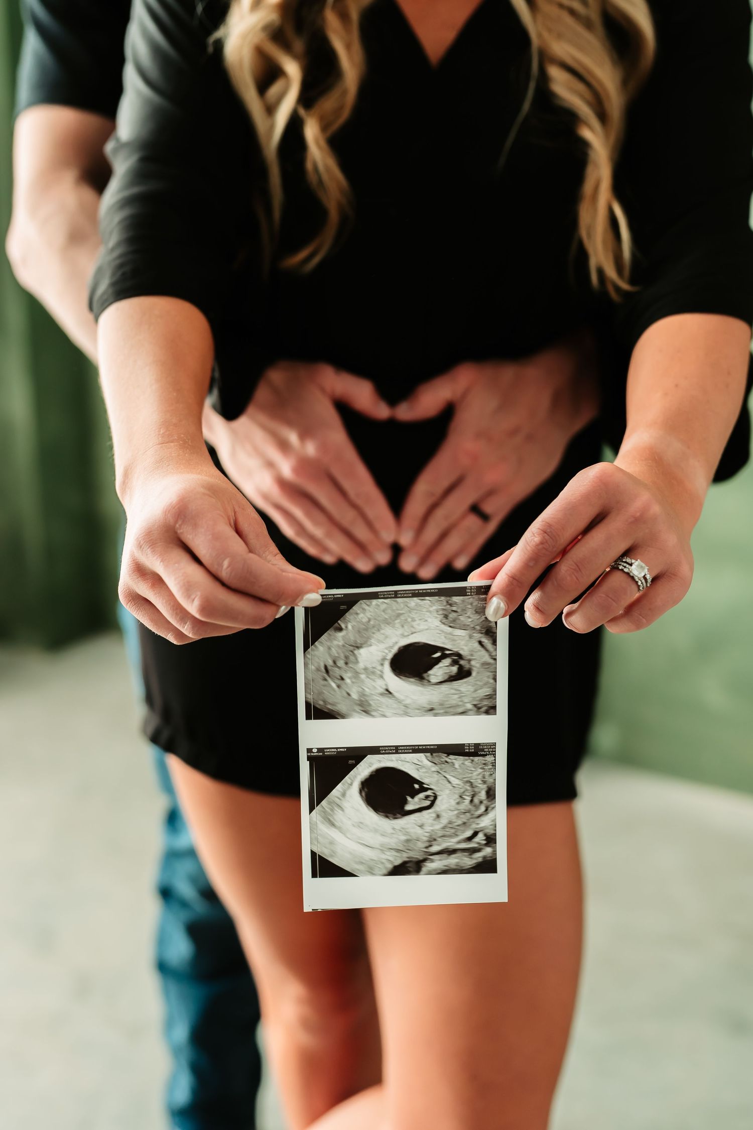 A series of photos showing hands holding ultrasound images while wearing a black dress, capturing a pregnancy announcement moment.