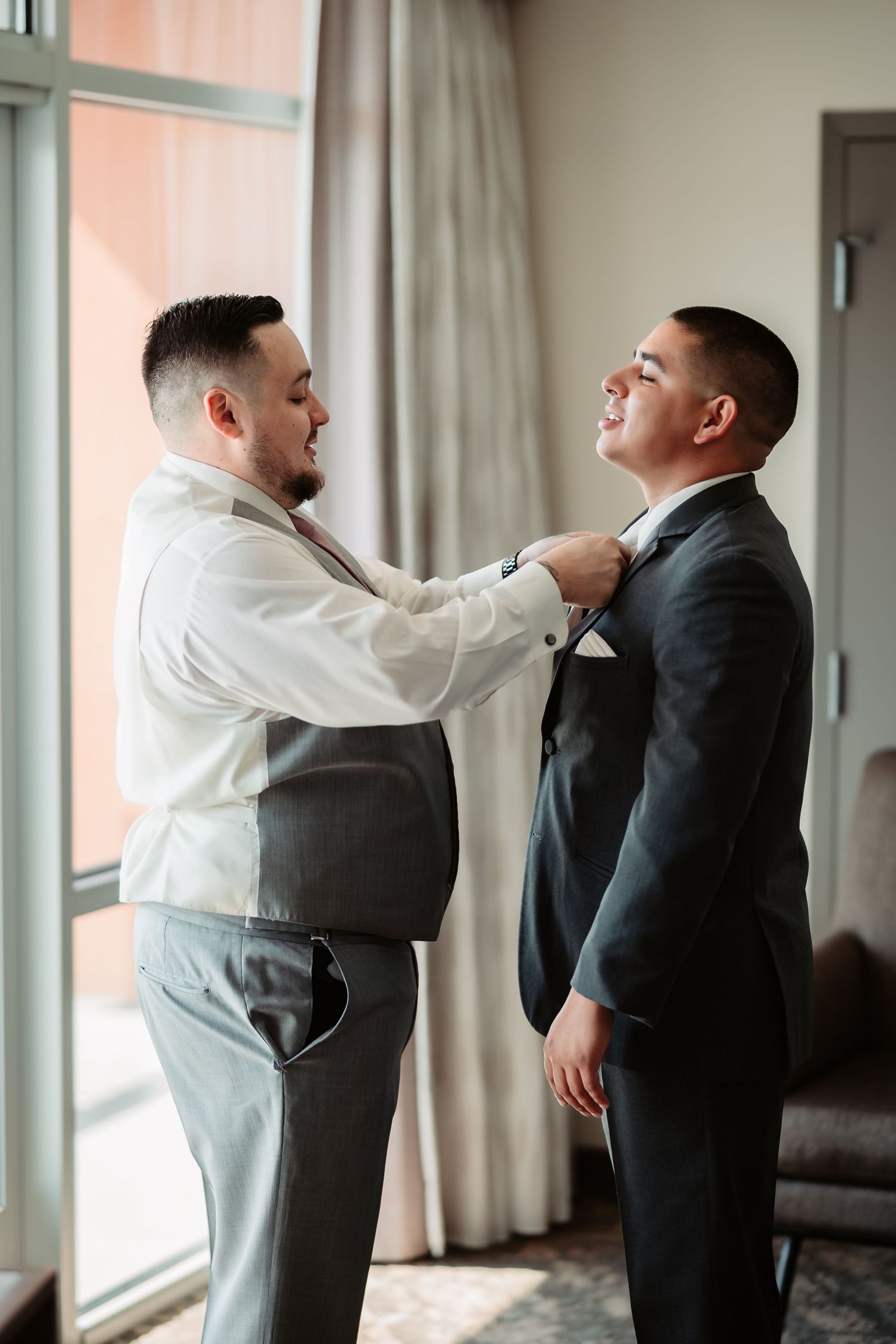 Series of shots capturing pre-wedding tie adjustment moments in a sunlit room.