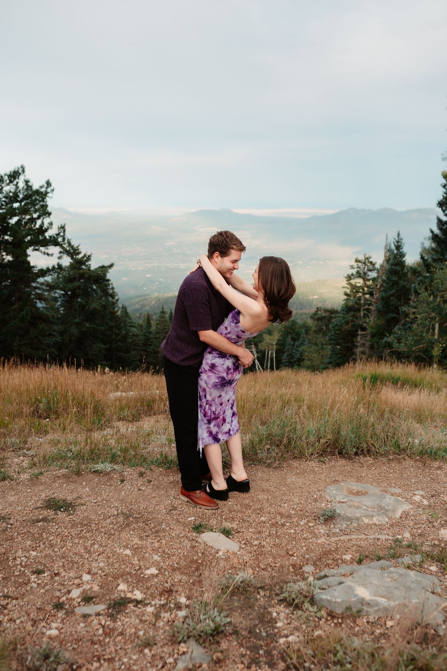 A romantic dance sequence photographed on a mountain overlook.