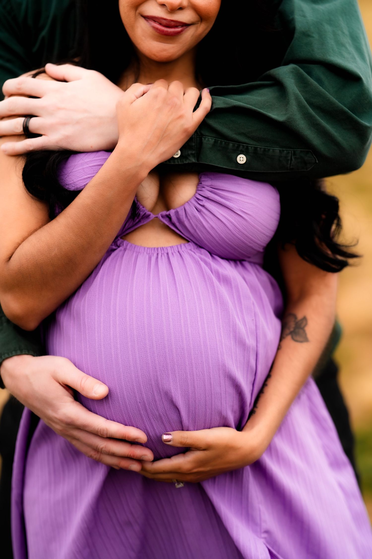 A series of photos showing hands lovingly cradling a pregnant belly in a purple maternity dress.