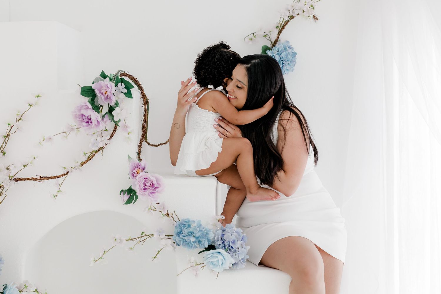A delicate collection of romantic bridal portraits against a light floral background shows soft feminine styling details.