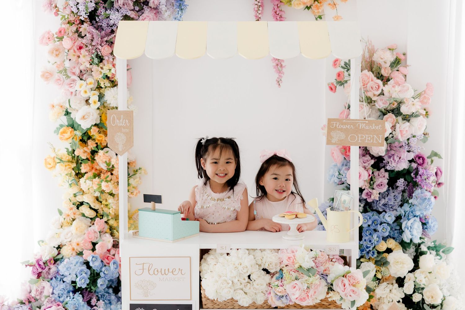 A collage of floral arrangements and decorative elements featuring pink, purple, and yellow blooms with white accents.