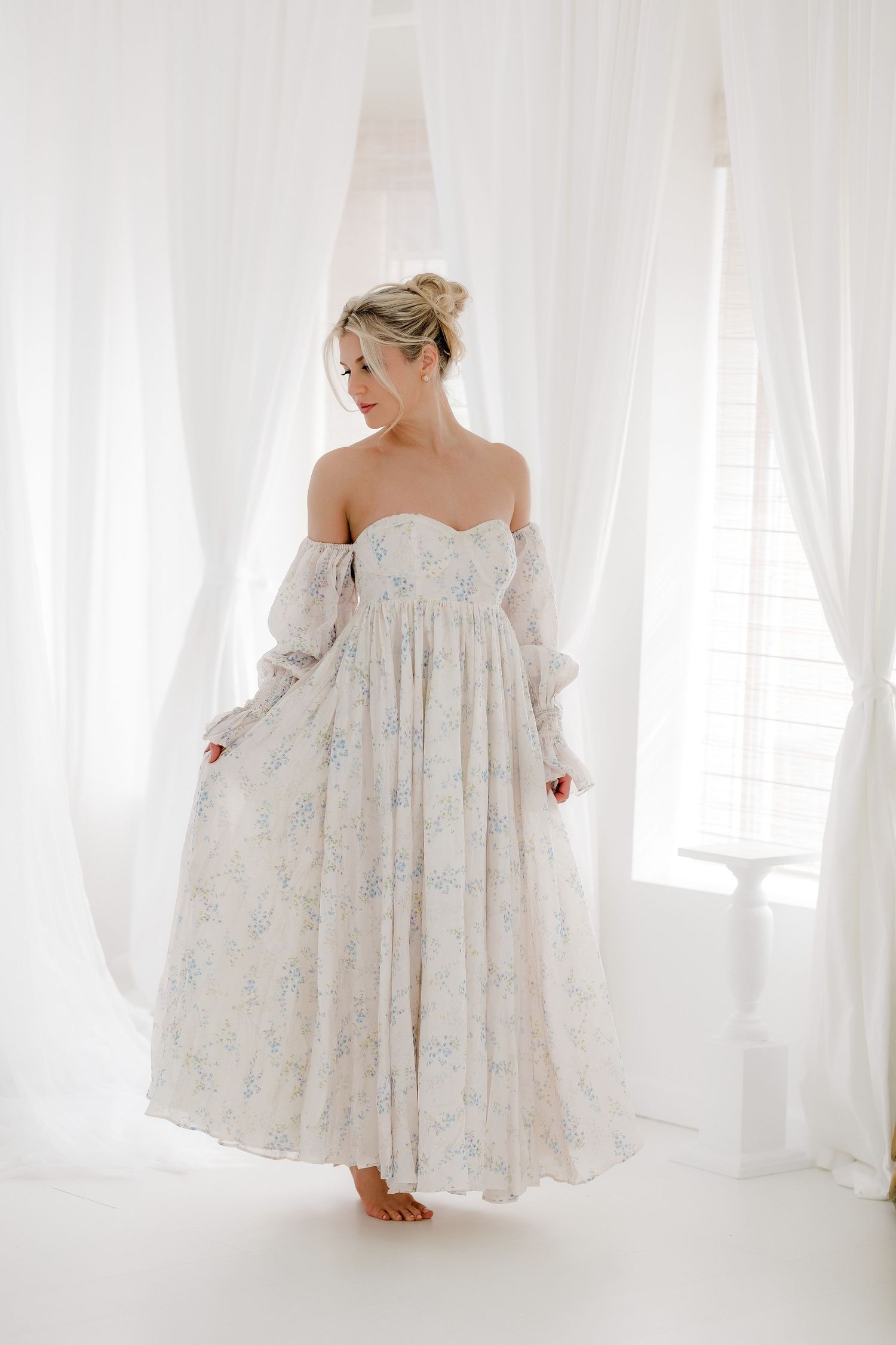 A flowy white floral dress with off-shoulder design shown from multiple angles in a bright white studio setting.