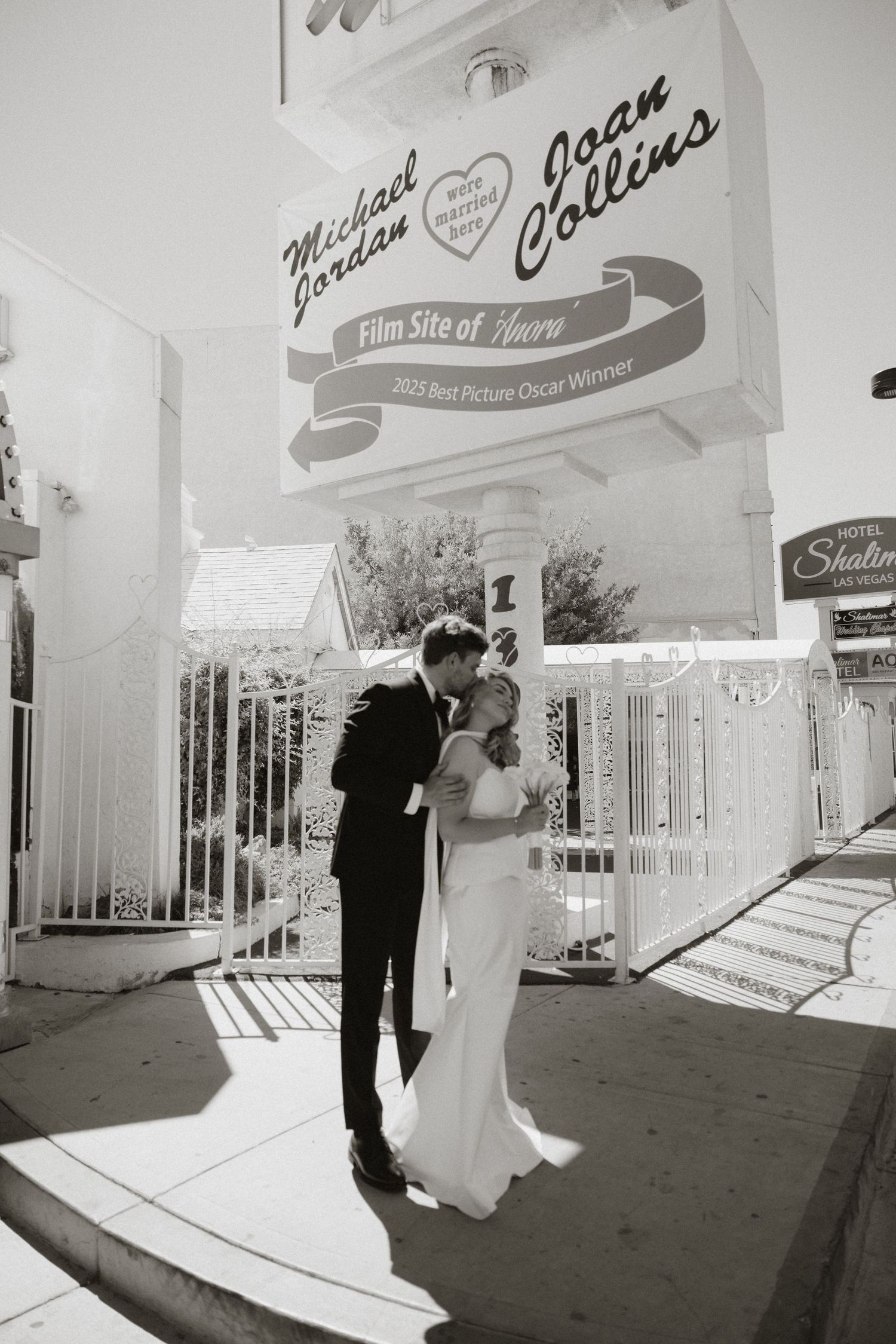 A vintage-style black and white wedding photo sequence outside a retro diner.
