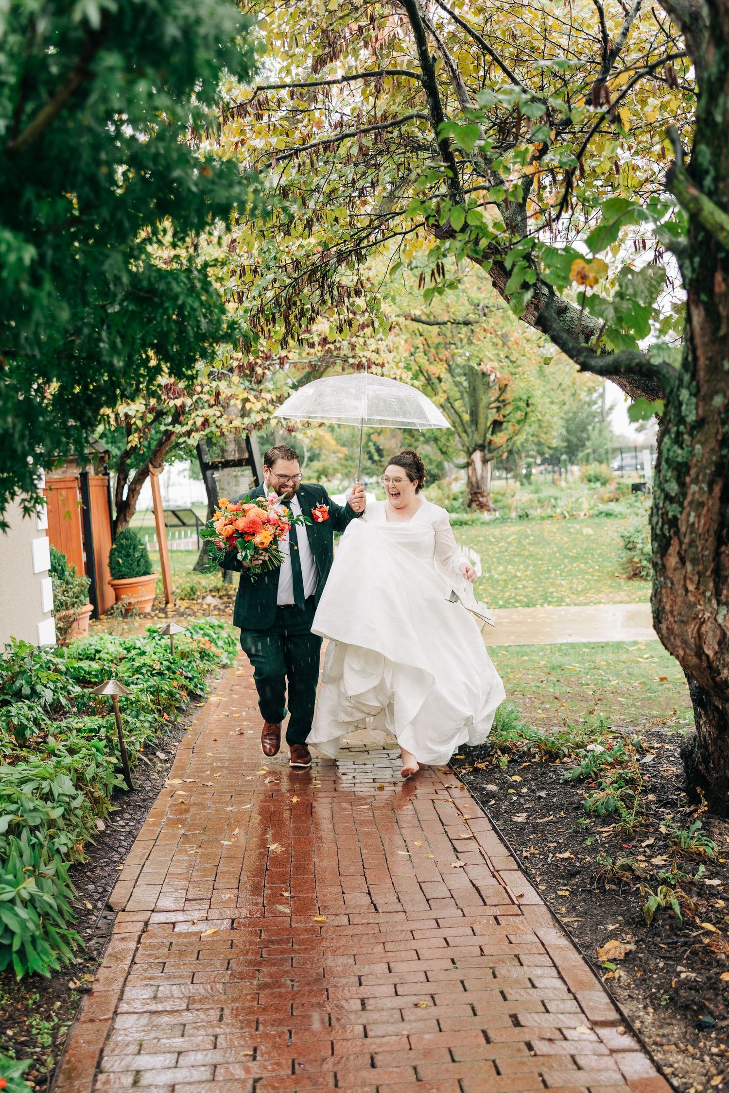 A brick pathway through autumn trees with flowing white dress movement captured in sequence.