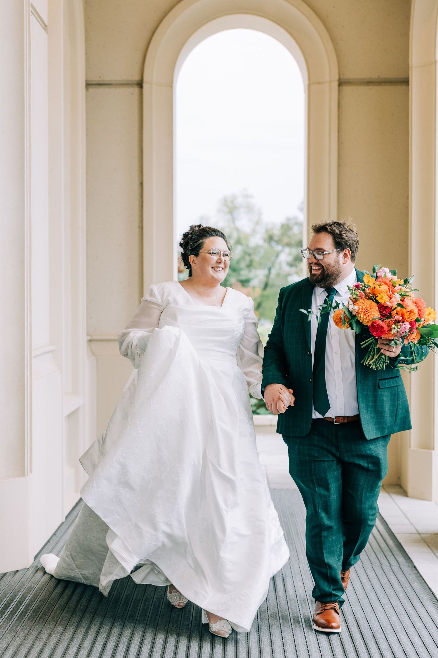 A sequence of joyful wedding moments captured in an elegant colonnade with green suits and white dresses.