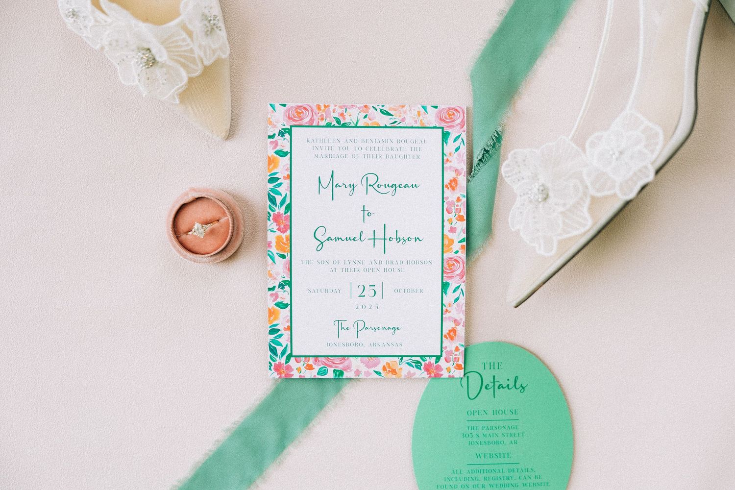 Elegant mint green and floral wedding stationery suite with delicate lace details and calligraphy.