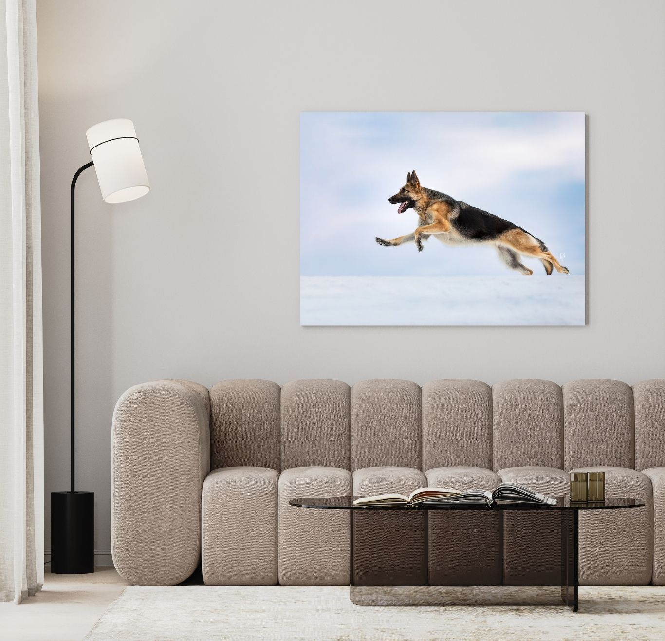 Beagle dog leaping gracefully across minimalist white living room with modern grey sectional sofa and wall art.