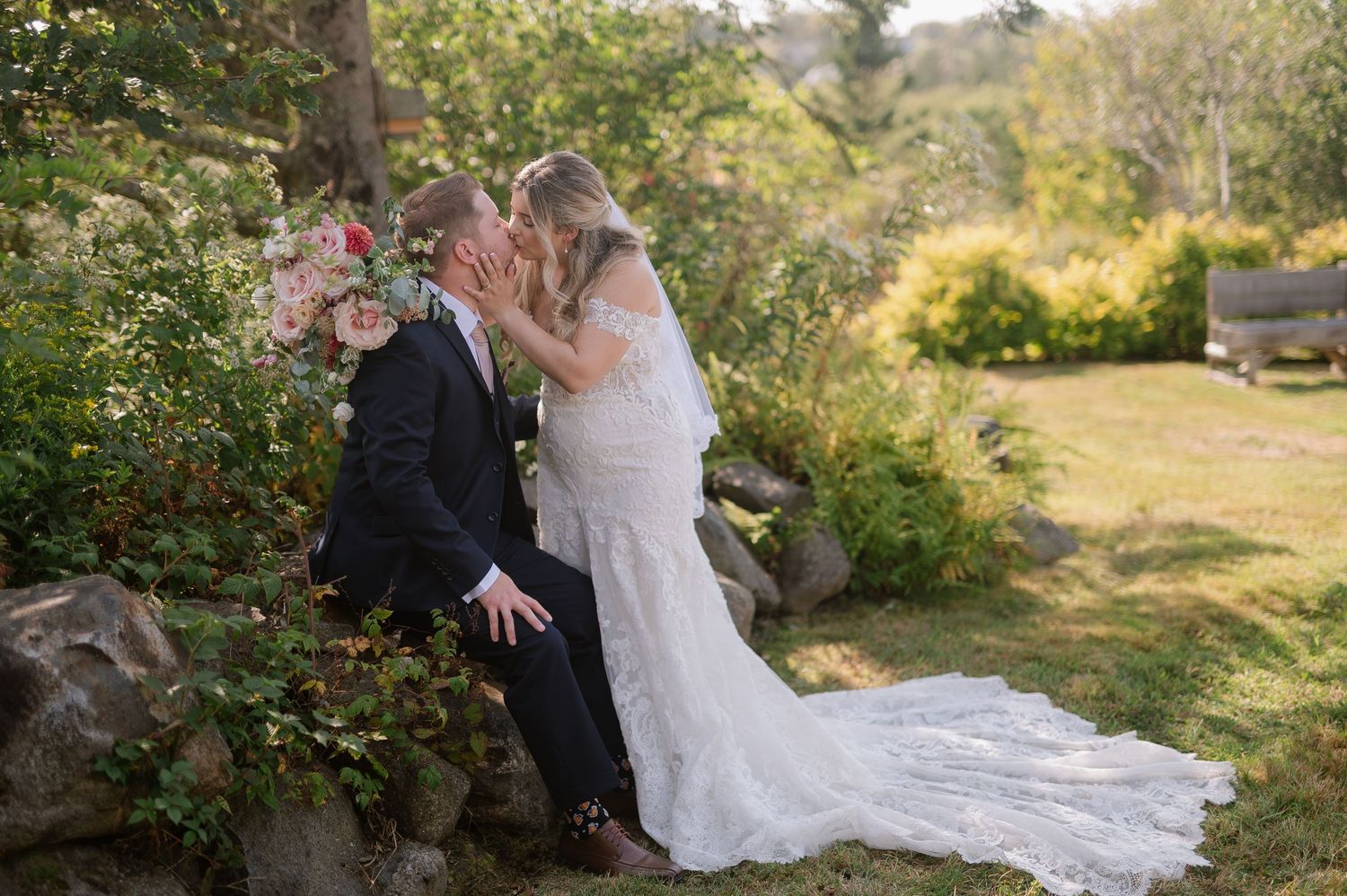 Outdoor wedding photography session in a lush garden setting with natural light.