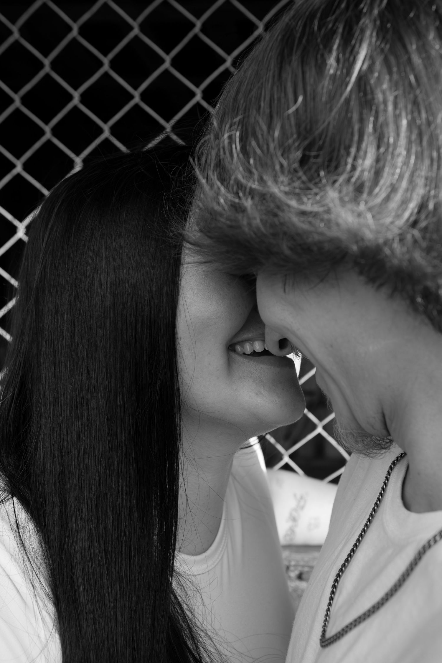 Couple enjoying Sioux Falls editorial outdoor engagement session, natural scenery, authentic romantic moments captured professionally