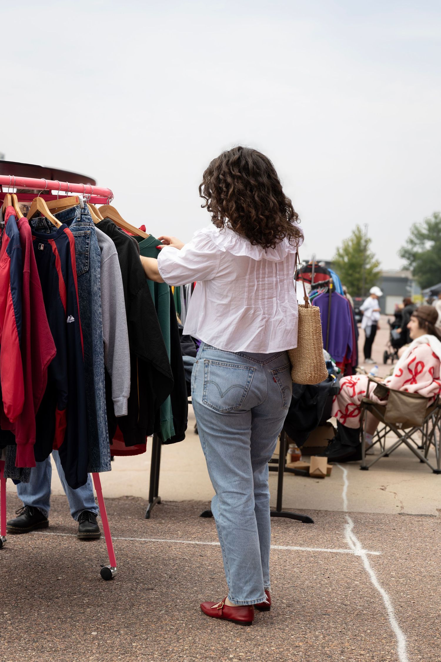 Outdoor Sioux Falls CozyEnergy market featuring local designers and fashion brands, captured by professional fashion photographer.