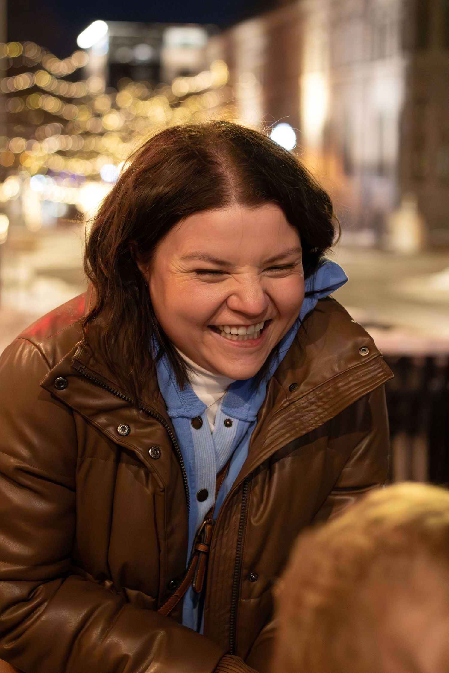 Engaged couple enjoying surprise proposal shoot, capturing love and excitement in Sioux Falls lifestyle engagement photos