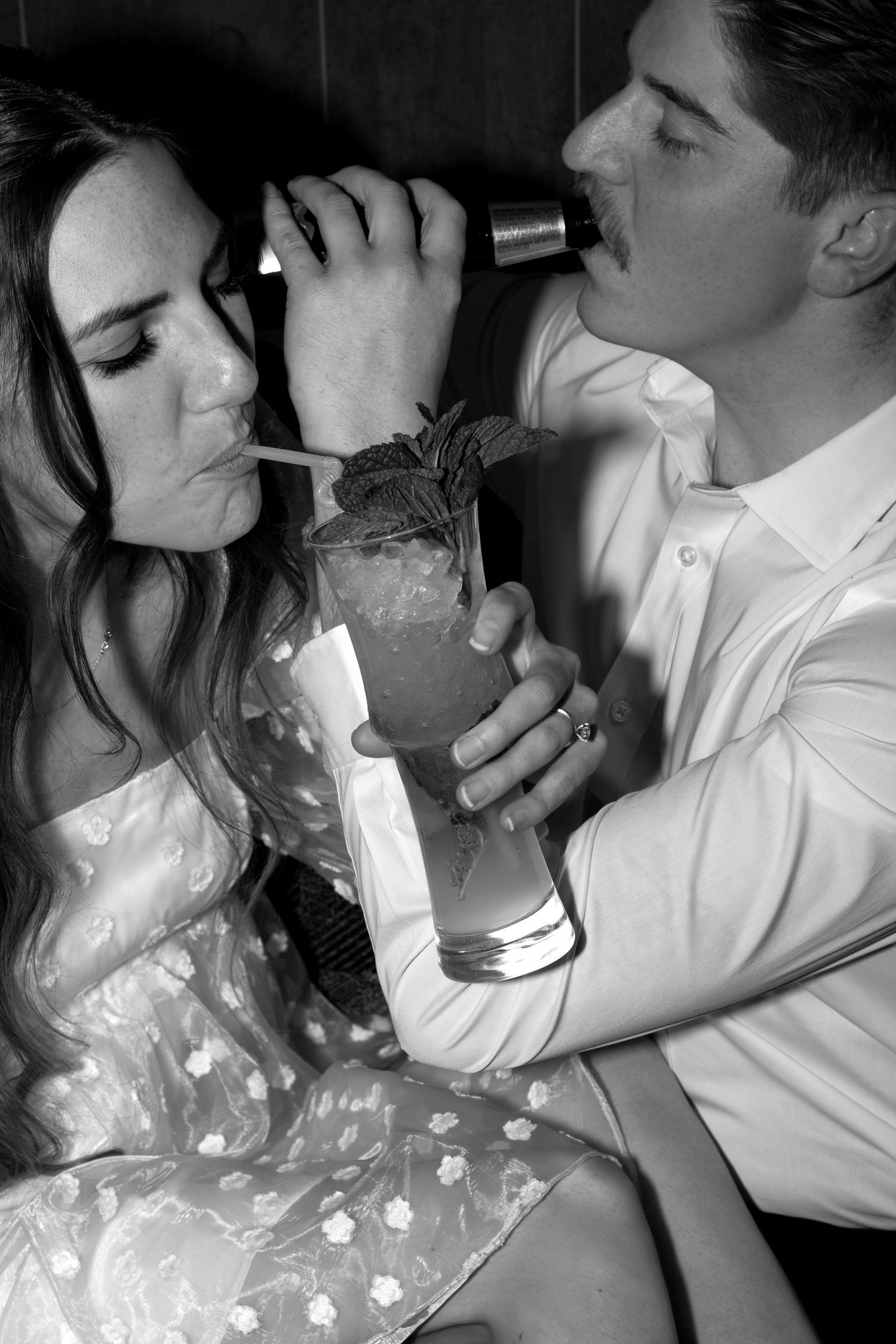 Couple enjoying a night out for an engagement session, urban evening photography capturing romance, connection, and modern engagement photos