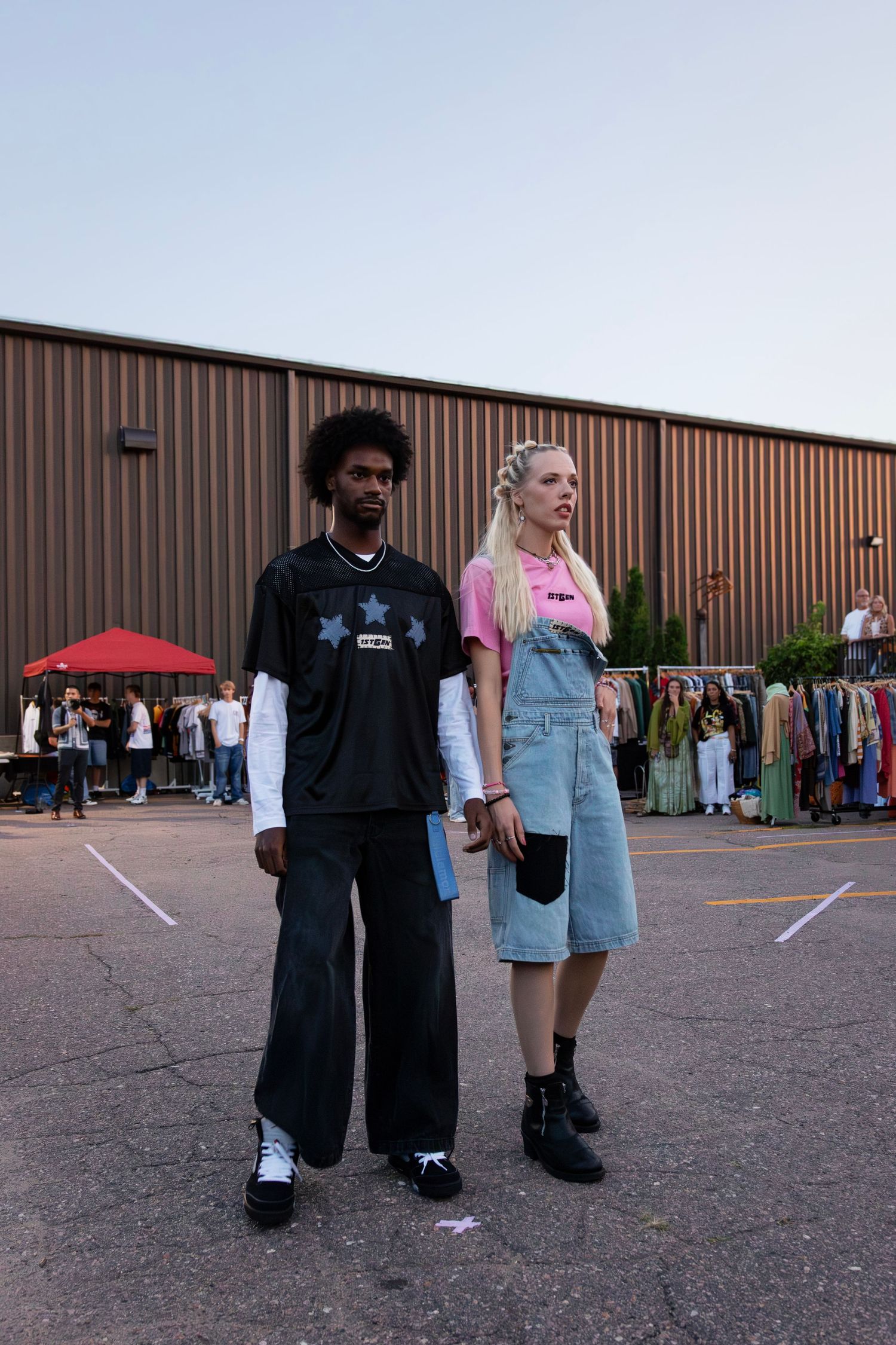 Creative outfit pairings showcased at an outdoor fashion show in Sioux Falls, captured by a professional fashion photographer.