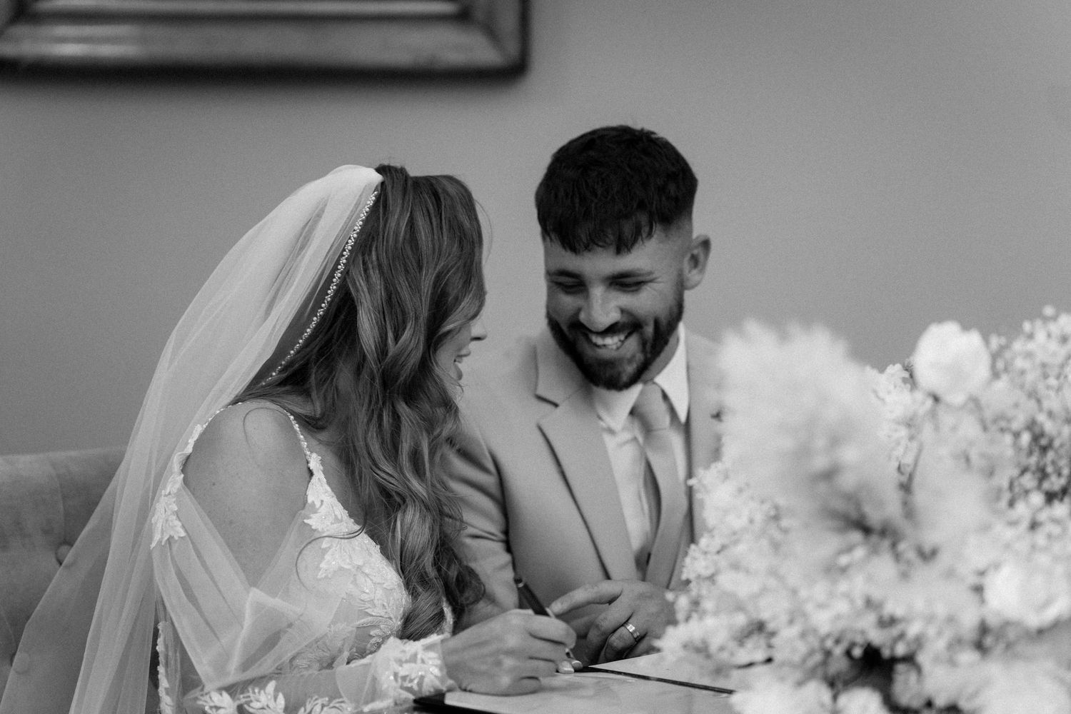 Romantic monochrome collage of intimate wedding moments showing couple embracing and celebrating their special day.