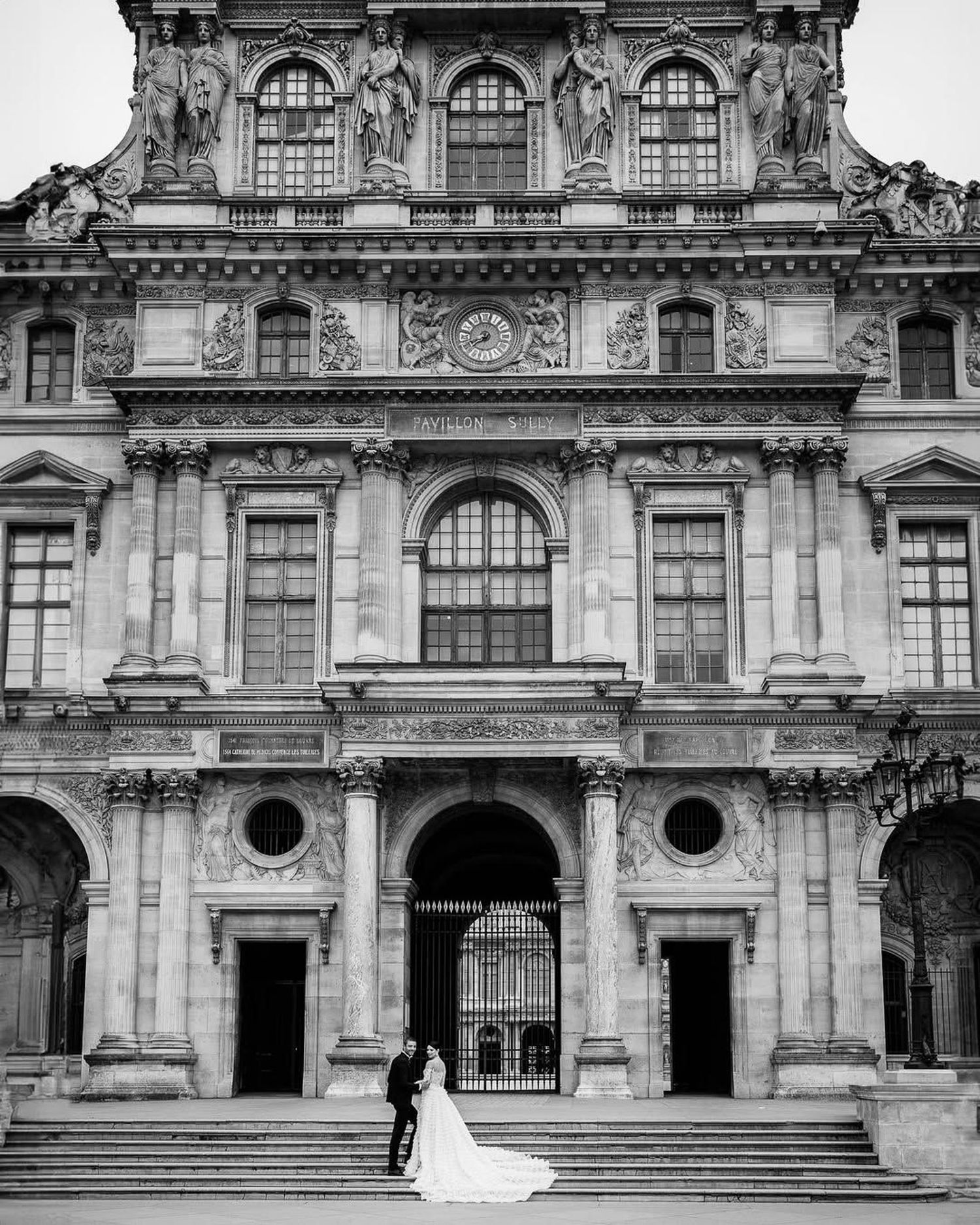 Black and white architectural photographs showing ornate classical building facades with grand stone steps and archways.