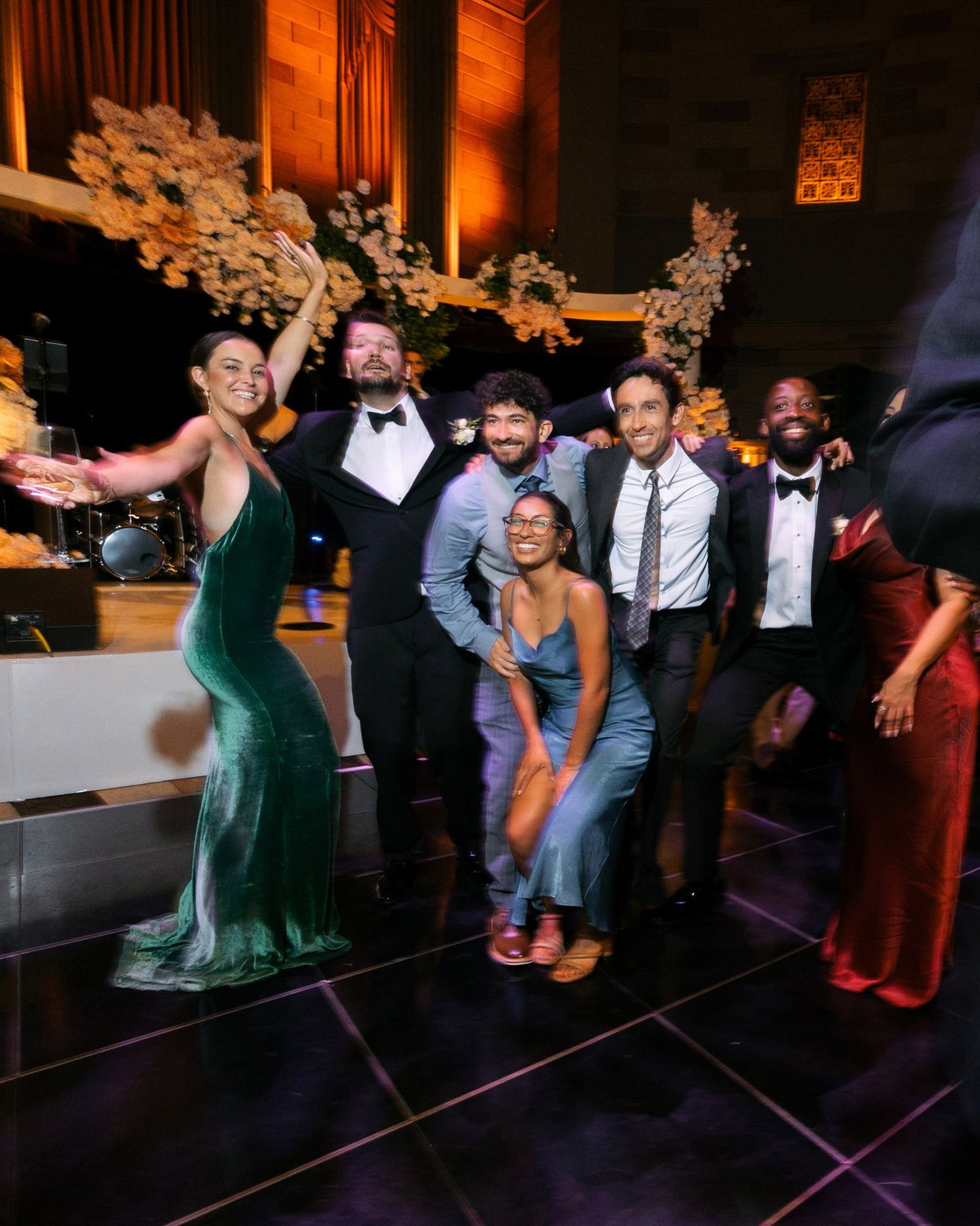 A sequence of wedding reception dance photos showing guests performing energetic dance moves on the dance floor.