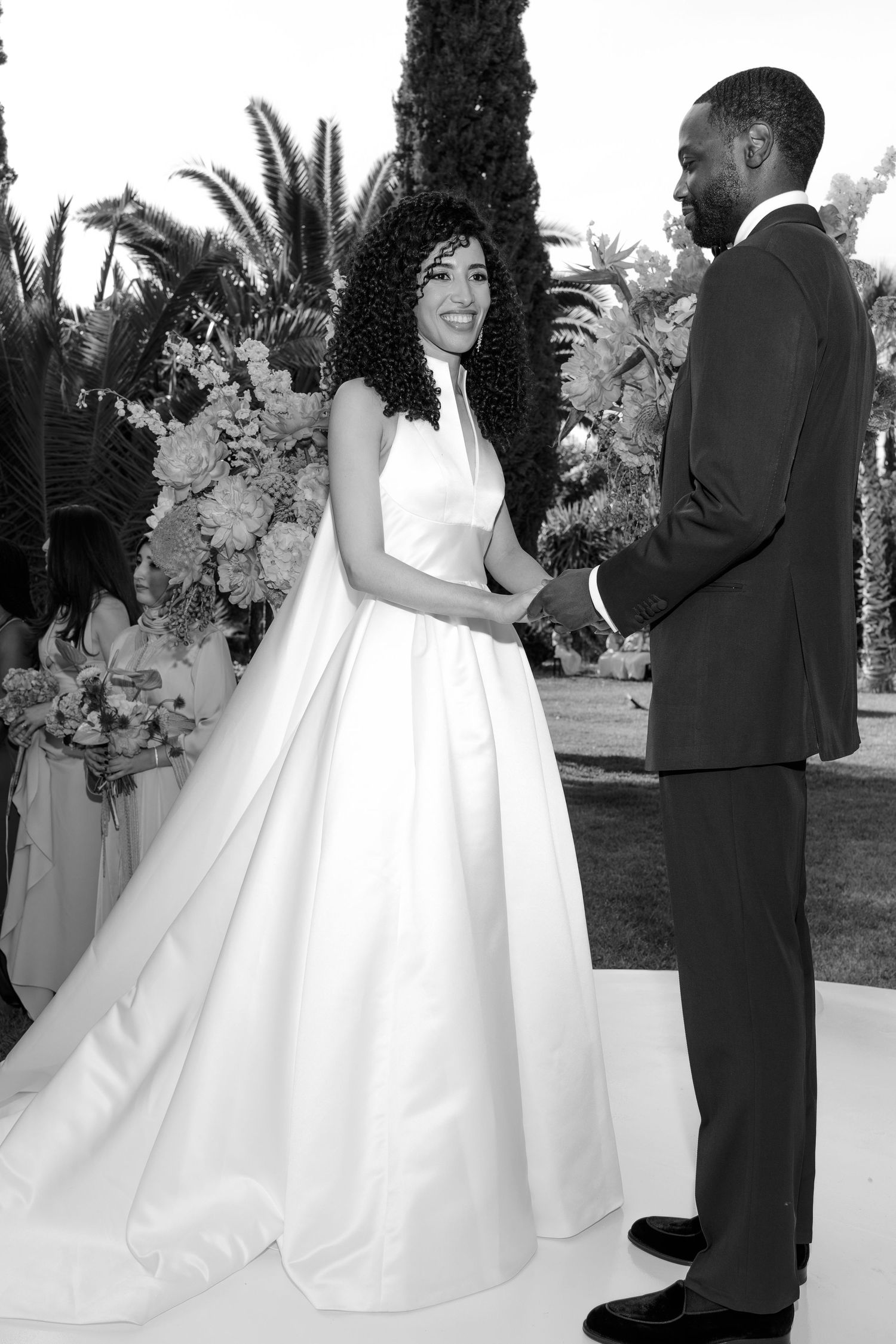 A series of elegant wedding photos showing a white ballgown dress being photographed outdoors.