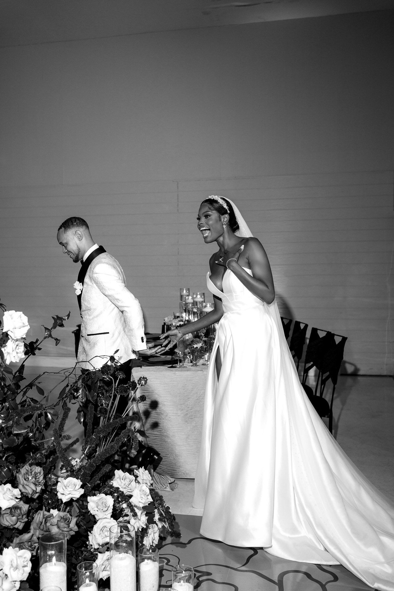 Black and white photo series showing a couple in wedding attire praying together at a decorated altar.
