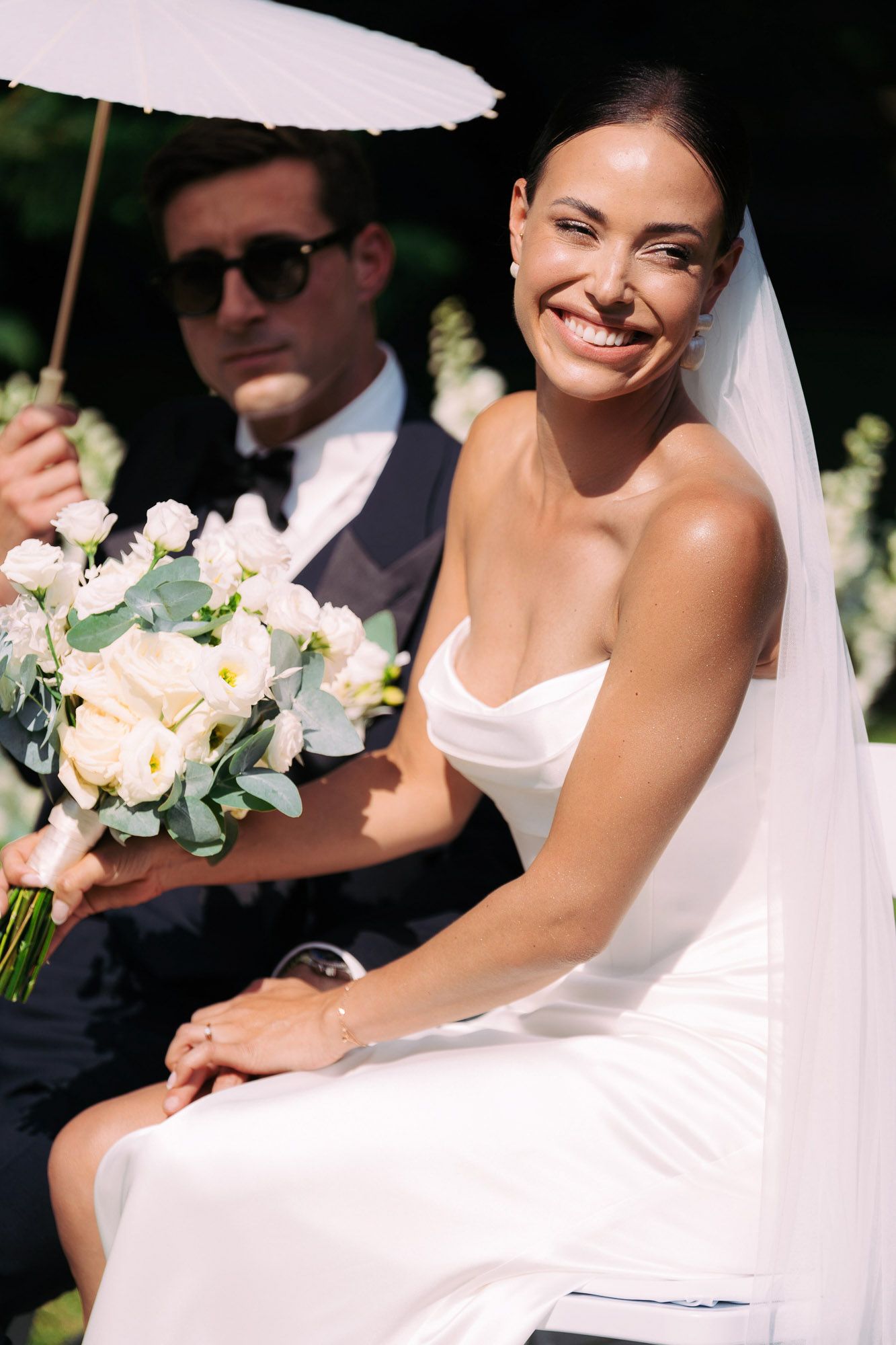 A series of candid wedding portraits showing joyful moments in an outdoor garden setting.