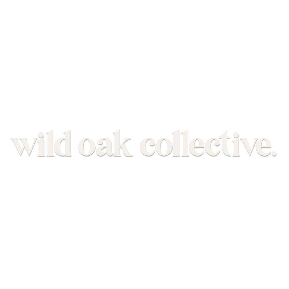 Wild Oak Collective logo in soft white serif font on a clean white background.