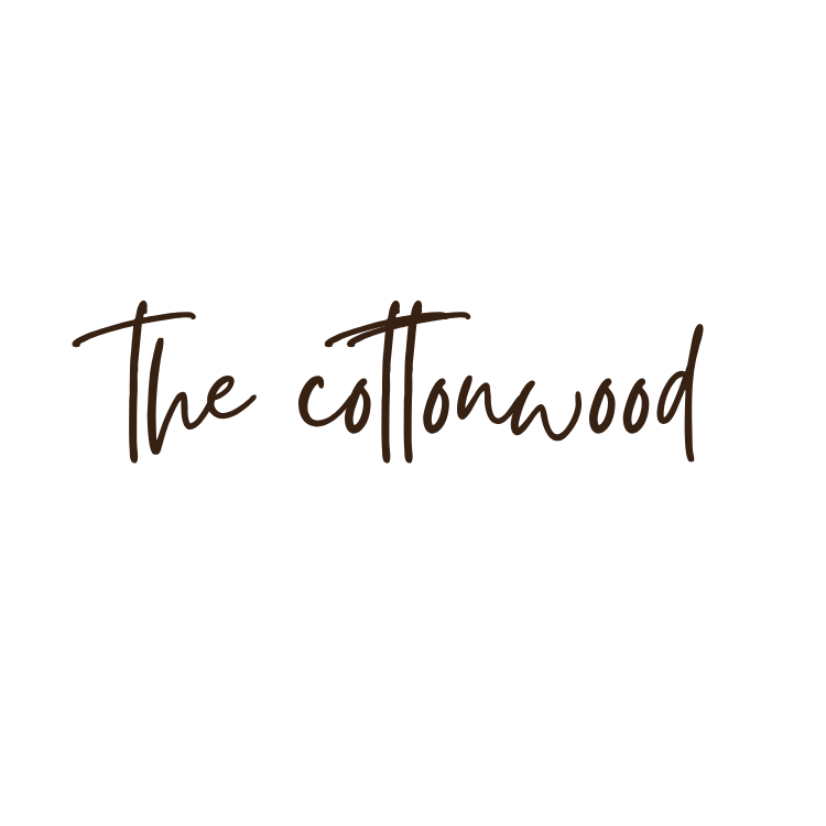 The Cottonwood cursive logo in dark brown script on a white background.