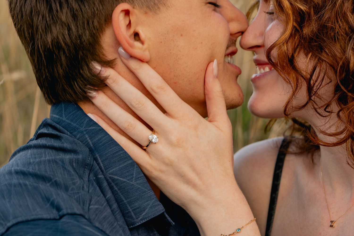 A romantic close-up photo sequence of a couple sharing tender kisses while wearing casual denim clothing.