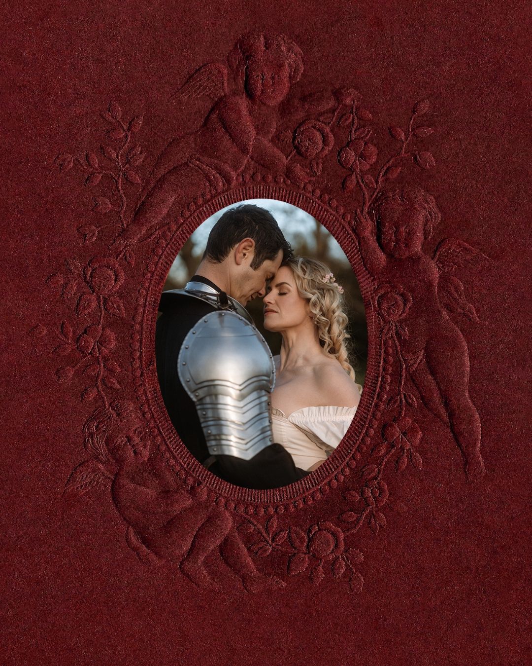 Red velvet book cover with embossed cherubs framing an oval photo of a romantic couple in medieval attire.