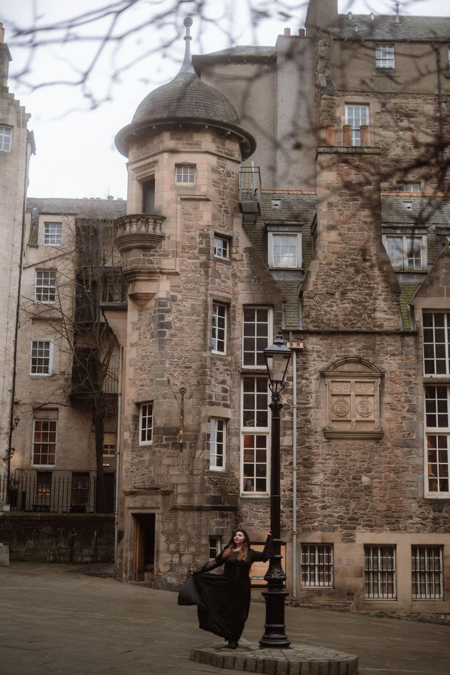 Historic stone courtyard with ornate architectural features at Edinburgh Castle showcases medieval Scottish design.
