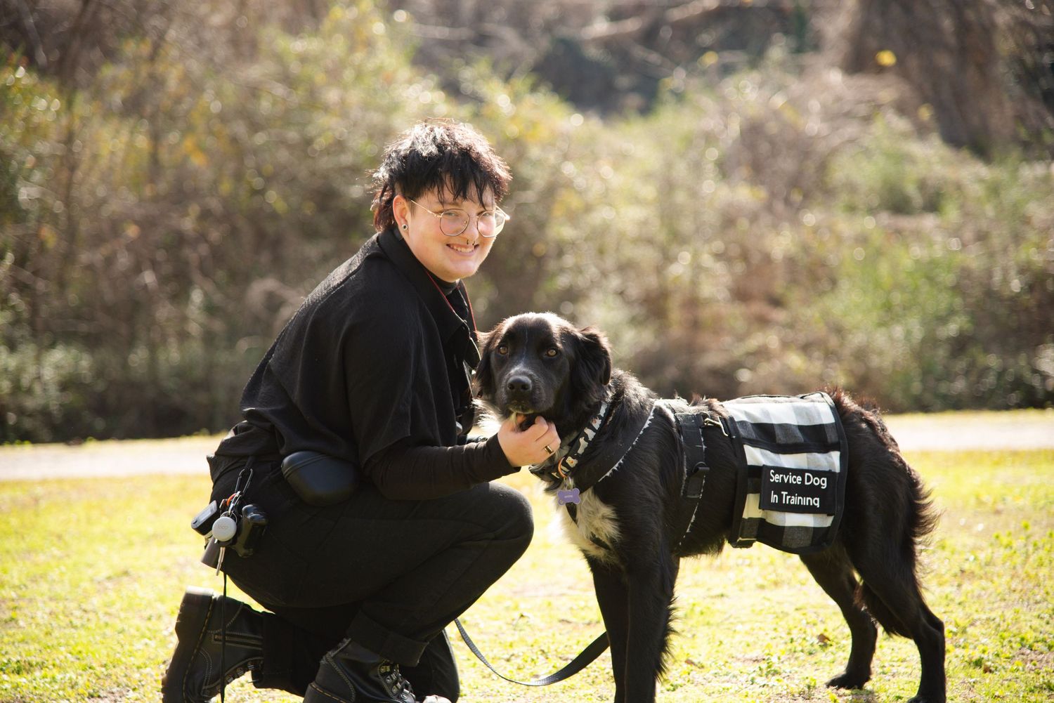 This is a photo of me, Ares, and my service dog in training.