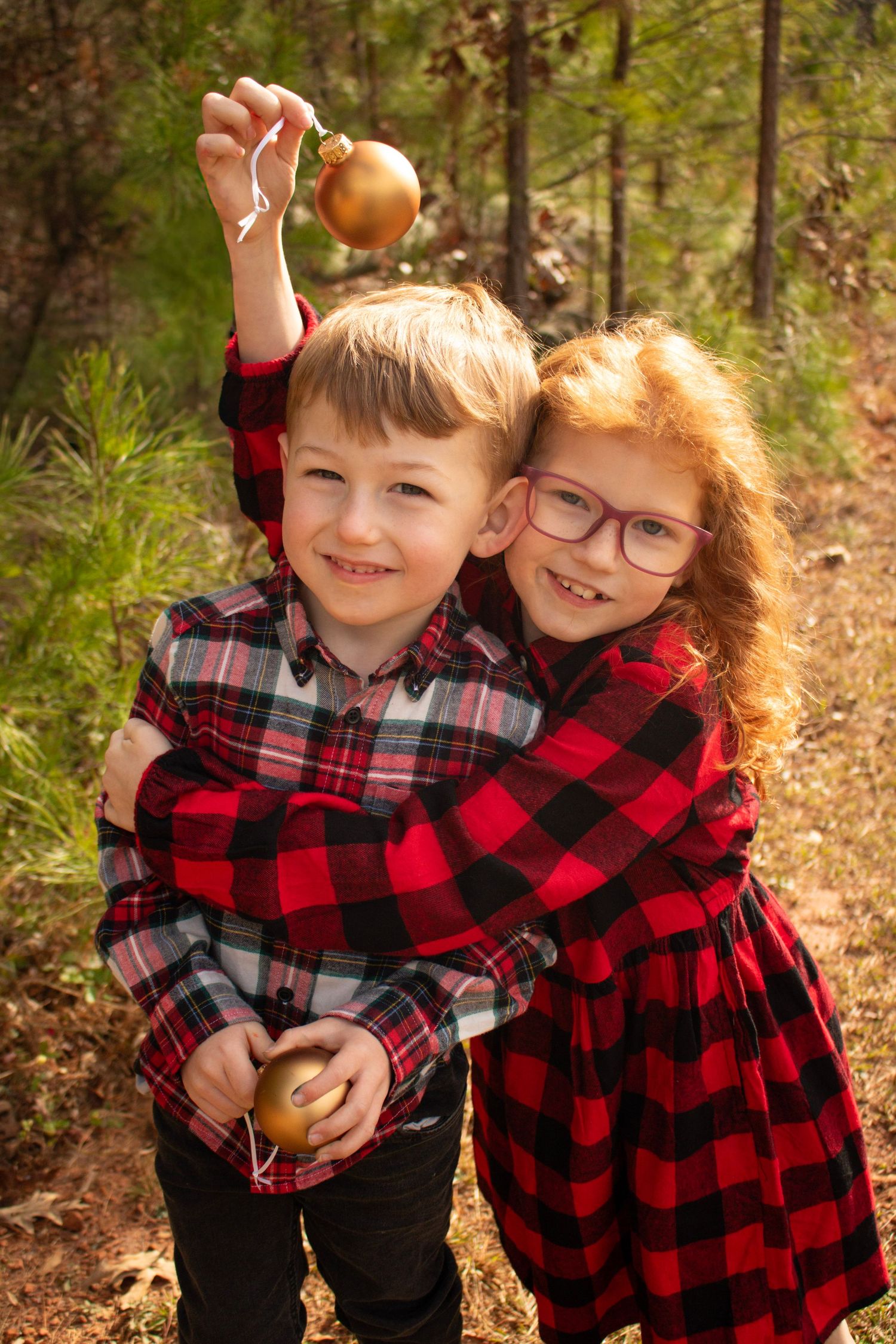This is a close up angle of two of the kids from the diverse family.