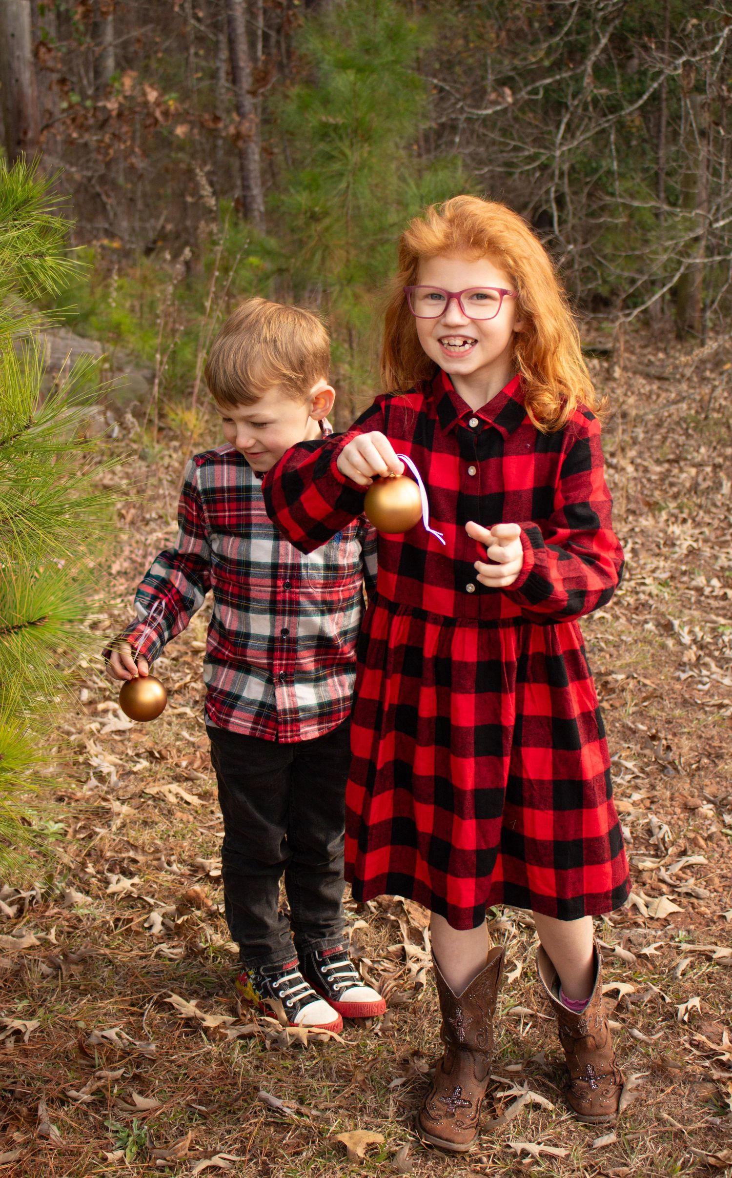 This is a close up angle of two of the kids from the diverse family.