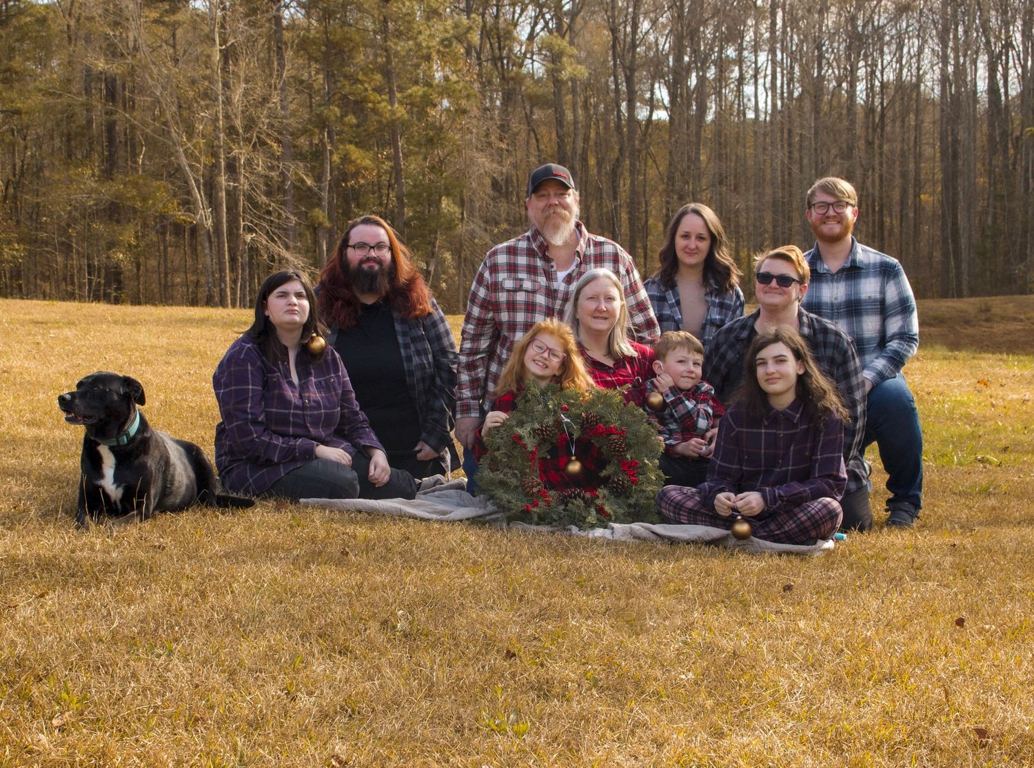 This is the full family photo from the Christmas session, including the family dog.