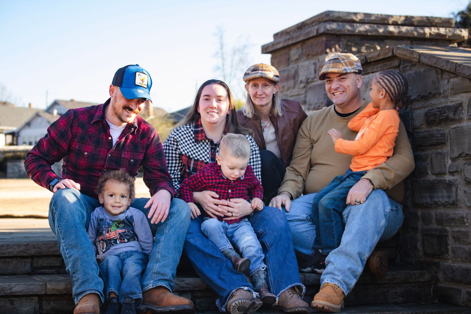This is a smaller family photo showing off the grand parents, their two kids and the grand kids.