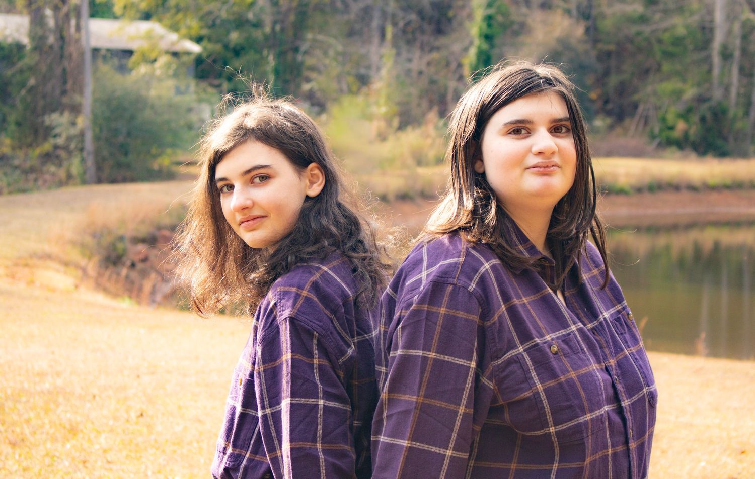 This is a close up angle of two of the kids from the diverse family.