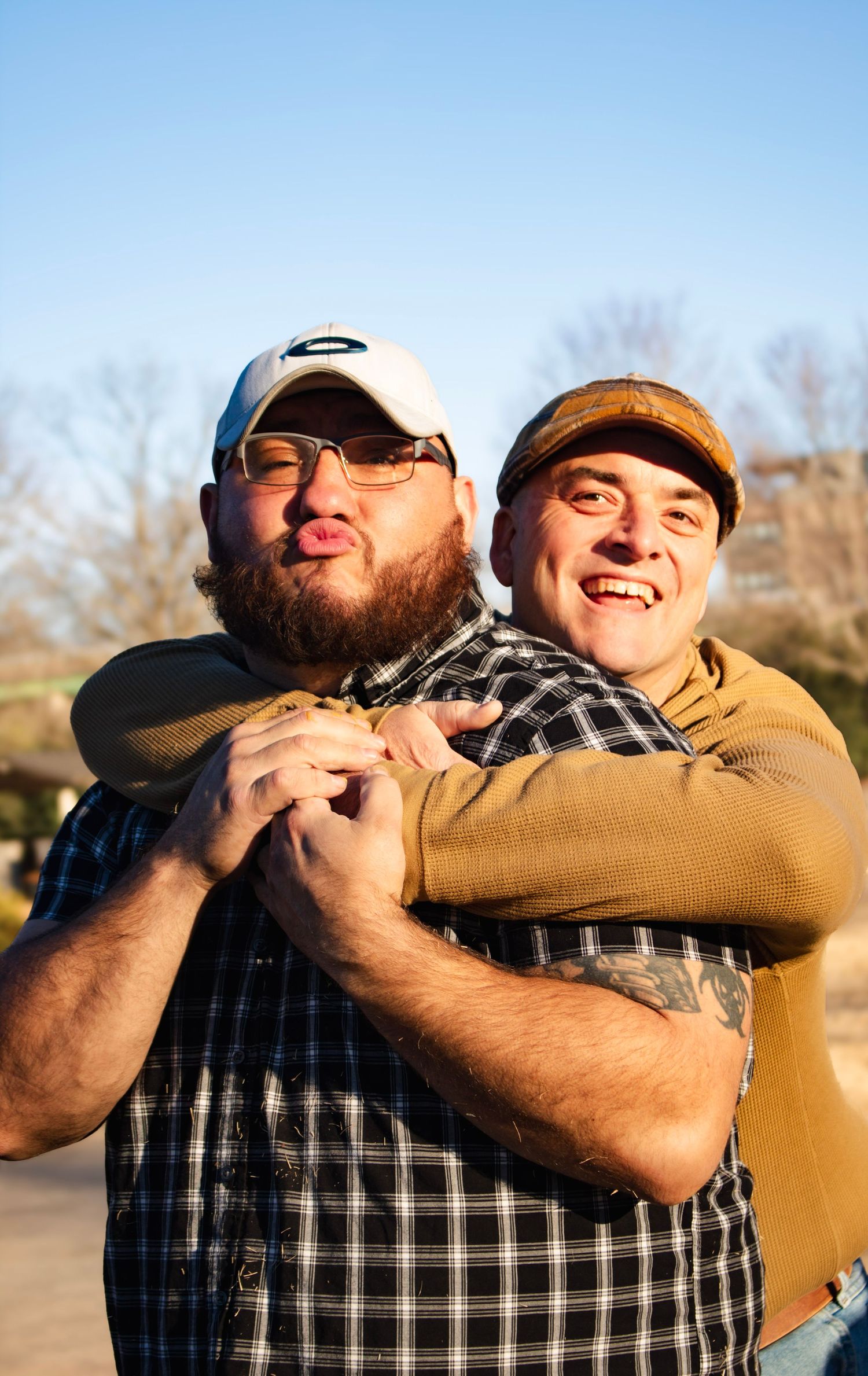 This is a goofy photo of the father in law and the son in law.