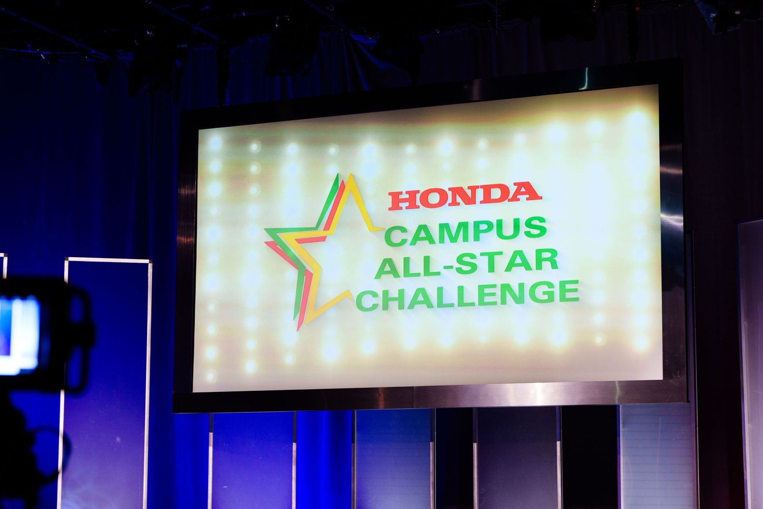 Stage setup with Honda Campus All-Star Challenge branding and lighting displays.