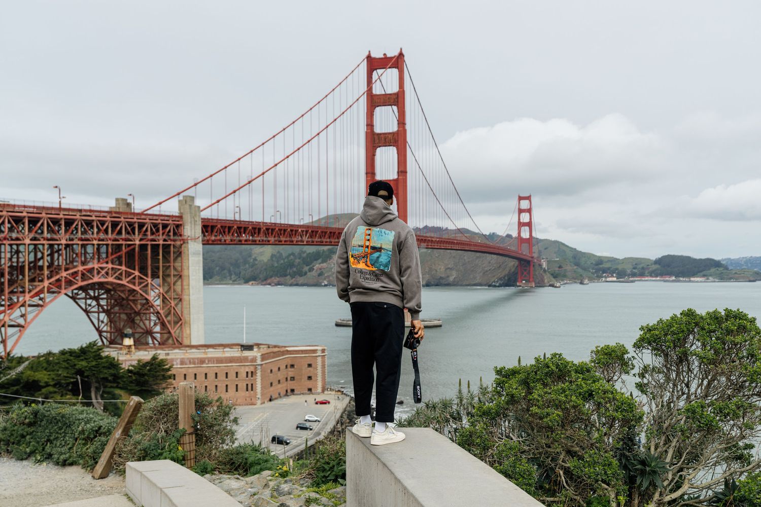 Panoramic view of the Golden Gate Bridge in San Francisco on a cloudy day.