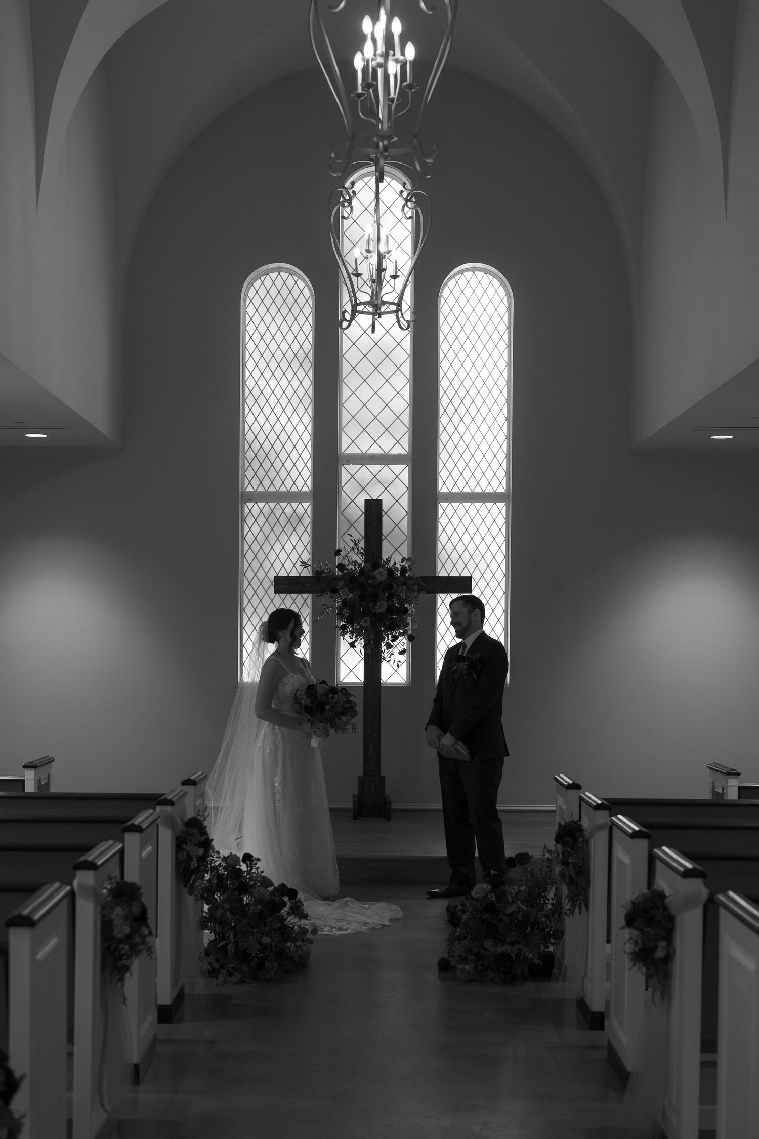 Black and white photo sequence showing a church interior with gothic windows and wedding ceremony setup.
