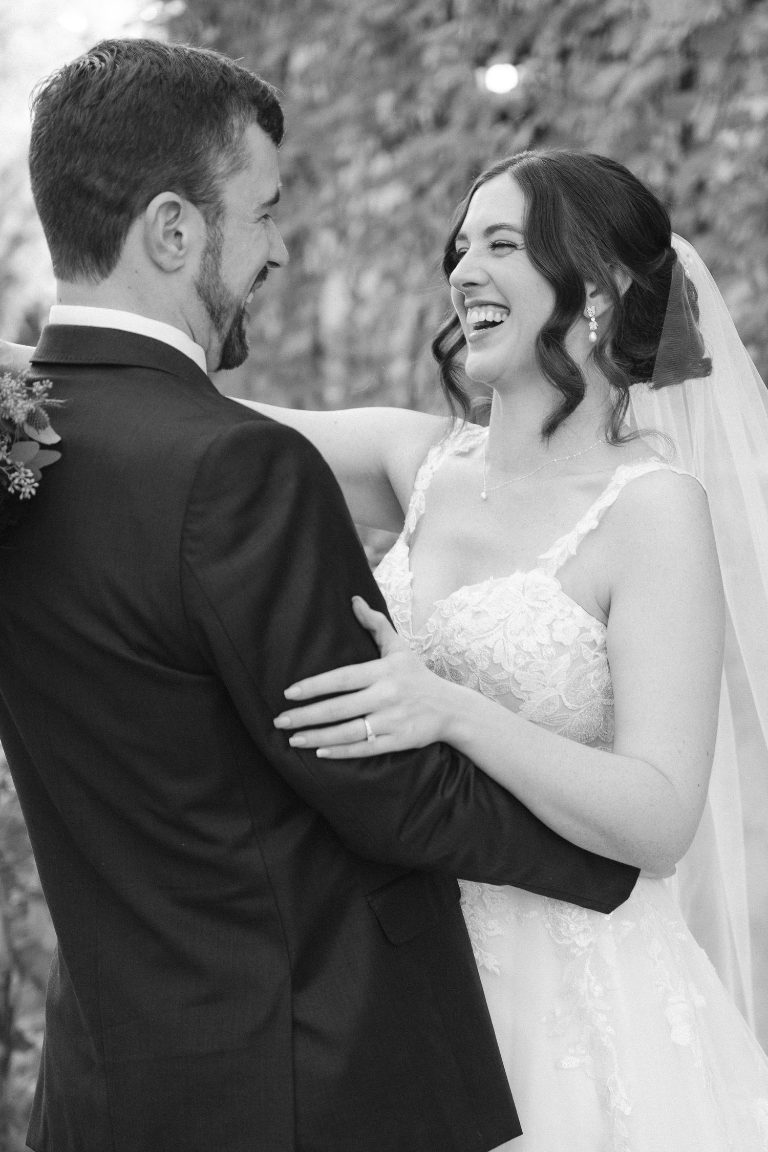 Black and white photo series of a romantic wedding moment between a couple in formal attire.