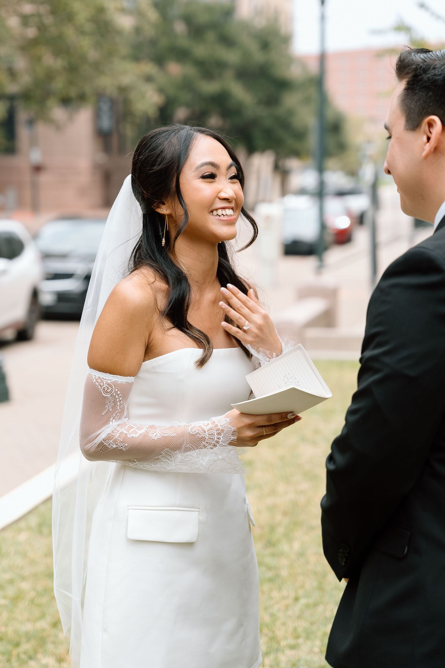 Intimate wedding moments captured outdoors during first look photos.