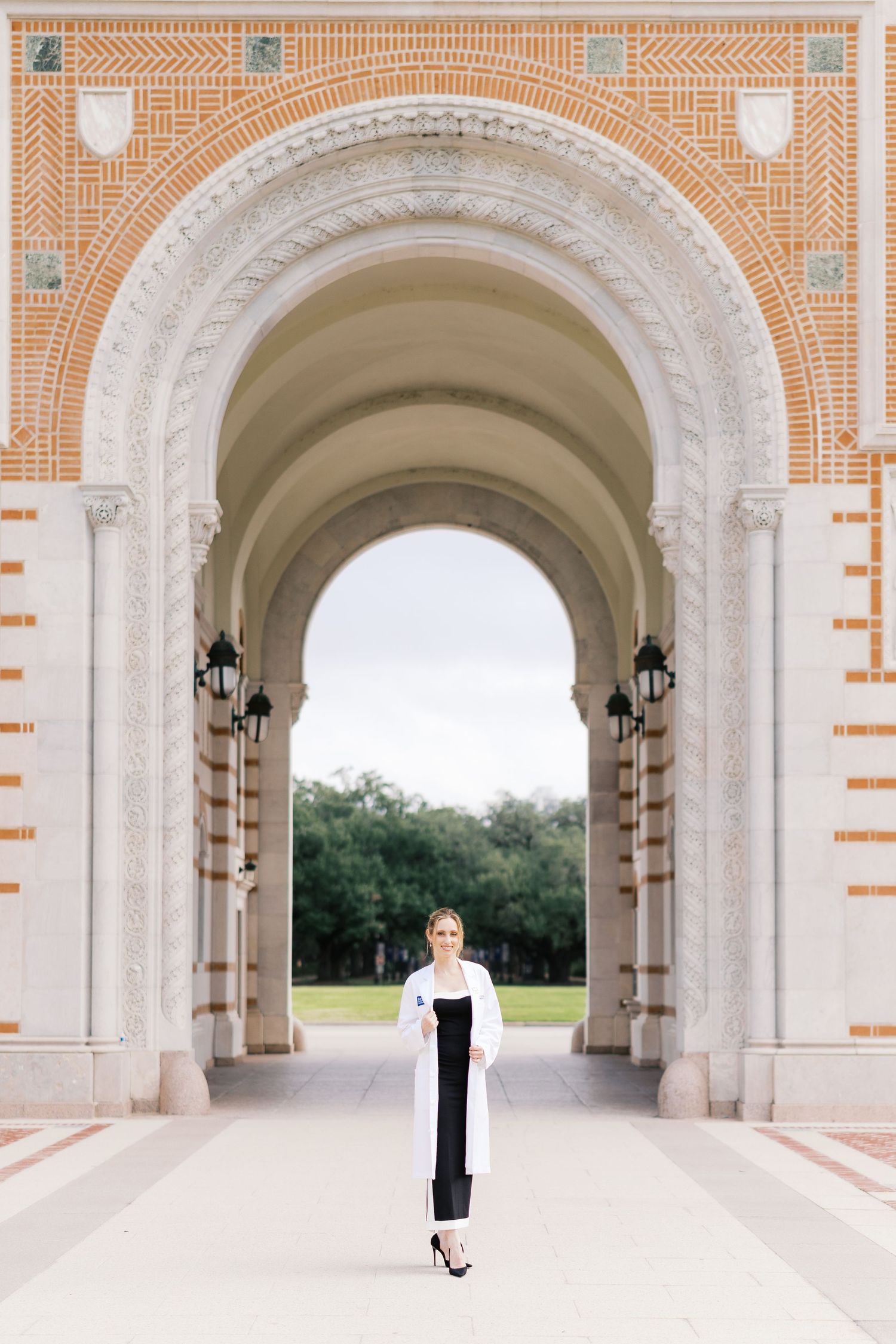 Elegant archway with terracotta and white architectural details creates dramatic perspective.